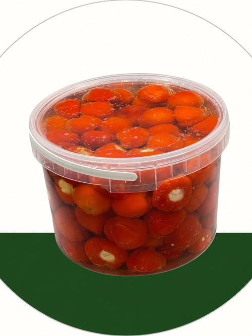 Dip-Oase.de Pepper Drops: rote Mini-Paprika in würziger Sauce, eingelegt in einer transparenten Dose.